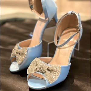 Light blue ankle strap-sandal with rhinestone bow
